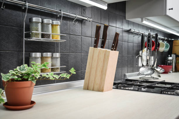istock Kitchen utensils and jars of spices 1026806314