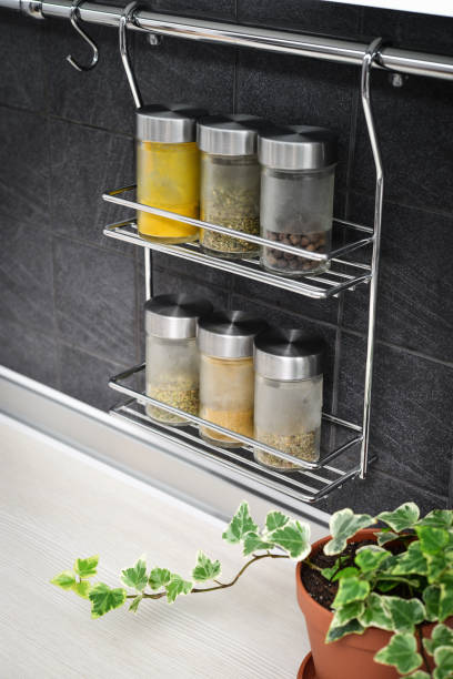 istock Jars of spices in hanging shelf 1026806364