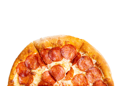 Top view of a half pepperoni pizza on white background with copy space.