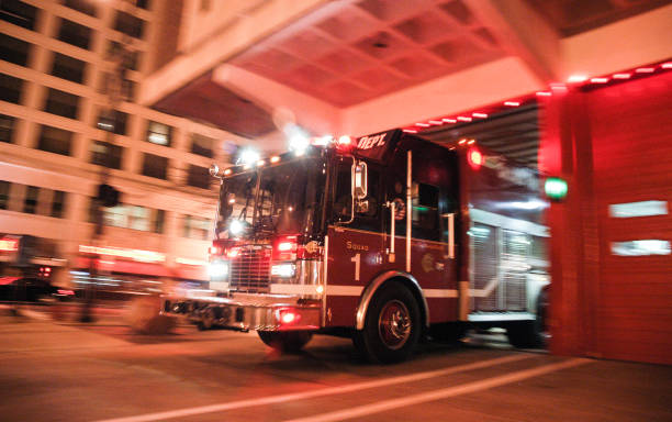 Chicago, IL, USA - March 15, 2006: A Chicago Fire Department (CFD) squad vehicle rushes to an emergency call in a blurred pan shot.