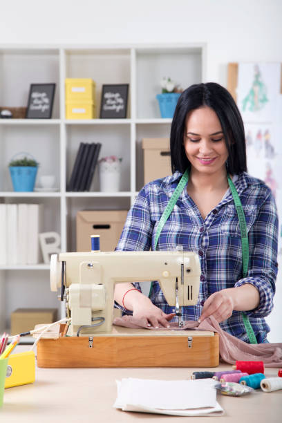 istock Young Beautiful fashion designer working in studio 1026834808