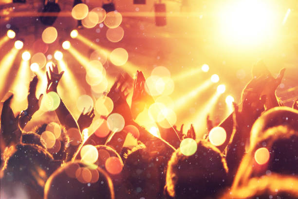 istock Filming concert on smart phone 1026835054
