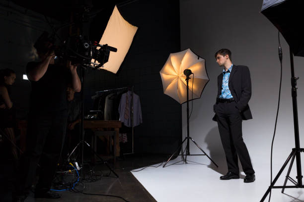 istock People Working Behind the Scenes on a Film Set 1026840944