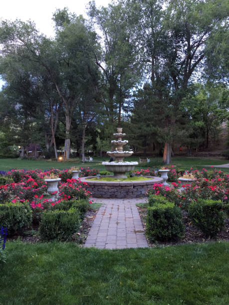 istock formal garden and water fountain 1026848610