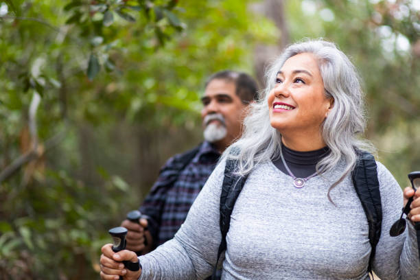 senior mexican couple hiking - senior adult mountain hiking recreational pursuit imagens e fotografias de stock