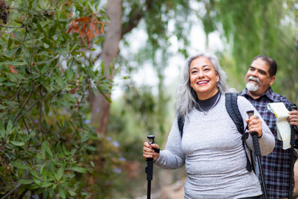 senior mexican couple hiking - senior women cheerful overweight smiling imagens e fotografias de stock