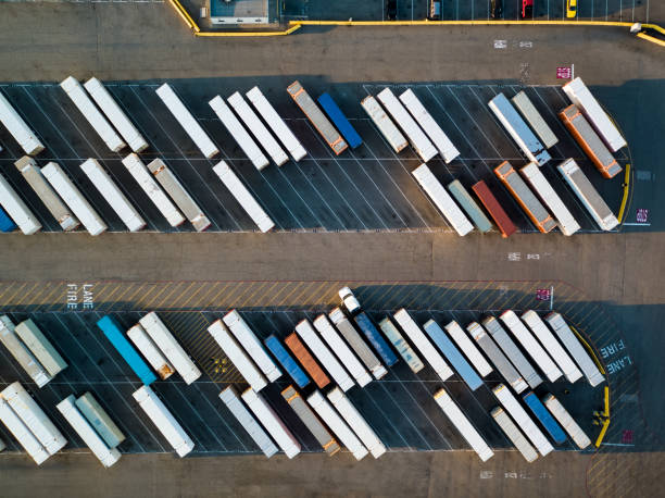 istock Truck Trailers Lined Up in Intermodal Freight Yard - Birds Eye View 1026861926