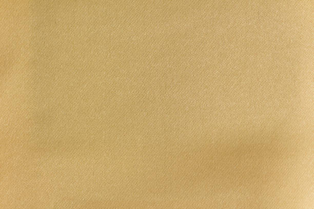 sfondo texture tessuto oro. - blue gold satin silk foto e immagini stock