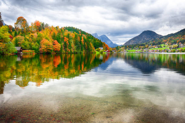 istock Idyllic autumn scene in Grundlsee lake. 1026867800