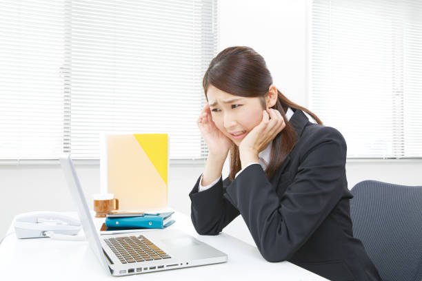 istock concerned Asian woman 1026868000