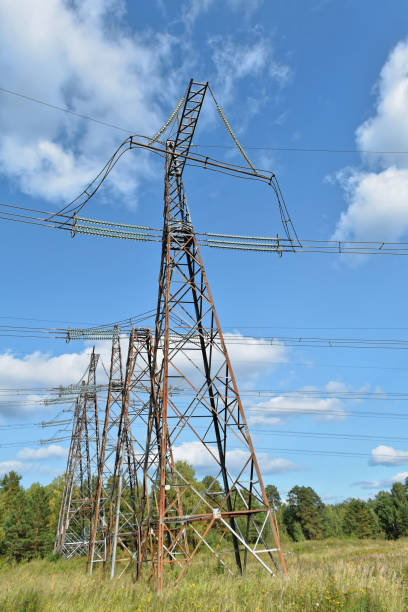 istock Power line support against the clear blue sky. High-voltage electricity transmission line 1026868286
