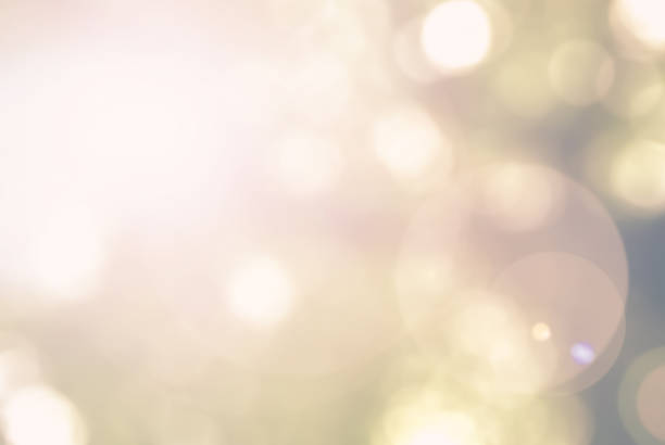 istock Blurred sky background with nature glowing sun light flare and bokeh 1026870874