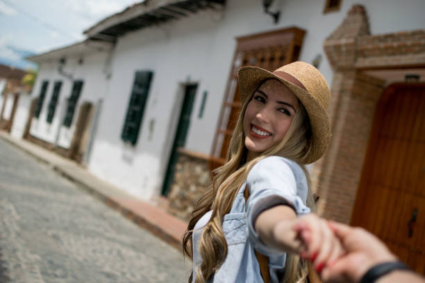 istock Beautiful woman holding her partners hand 1026871800