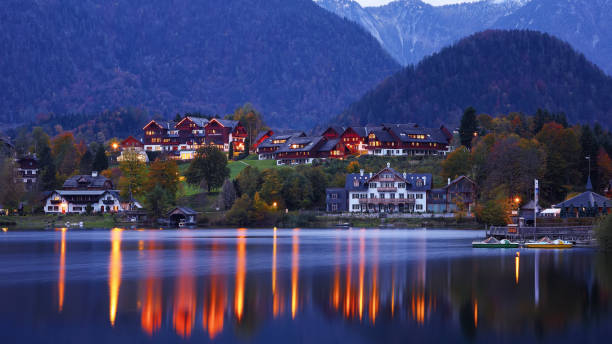 Dramatic and picturesque scene at evening lake Grundelsee. Mirror reflection. . Location: resort Grundlsee, Liezen District of Styria, Austria, Alps.