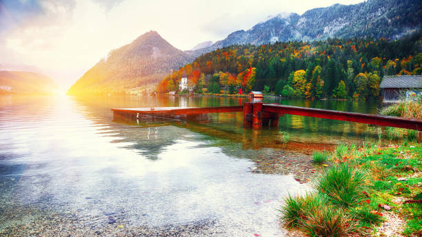 istock Idyllic autumn scene in Grundlsee lake. 1026875378