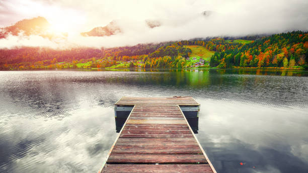 istock Idyllic autumn scene in Grundlsee lake. 1026876084