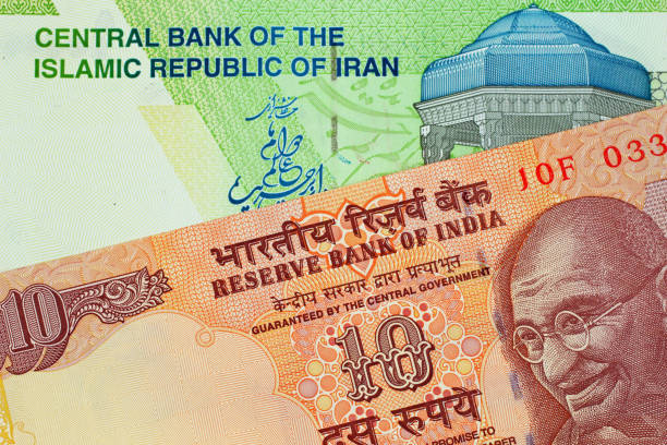 istock An Indian 10 Rupee Note With An Iranian 10000 Rial Bank Note 1026878212