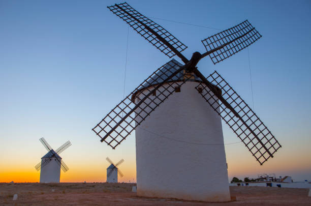 istock Traditional windmills at rising, Campo de Criptana, La Mancha, Spain 1026880836