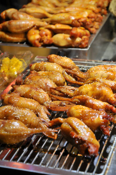 istock Chicken wings stuffed with shrimps on BBQ stand 1026880850