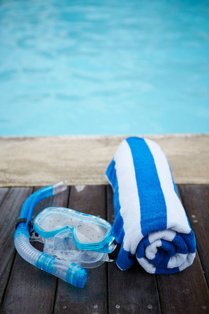 istock Snorkeling mask and beach towel 1026881144