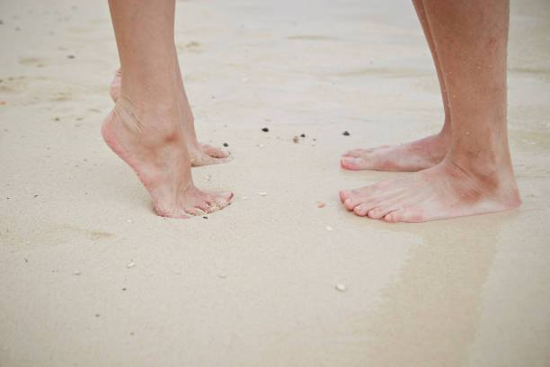 istock Couple kissing at the beach 1026881370