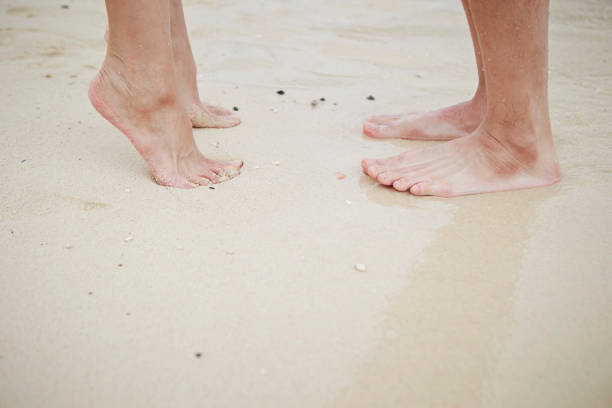 istock Couple kissing at the beach 1026881384