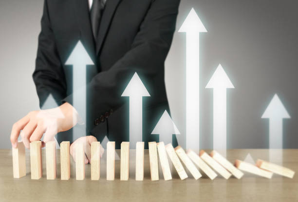 istock Stopping domino concept 1026897160