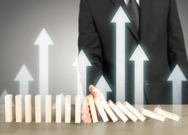 istock Stopping domino concept 1026897172
