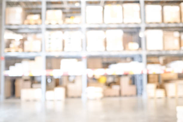 istock Blurred business background, Blur warehouse with bokeh light background 1026909876
