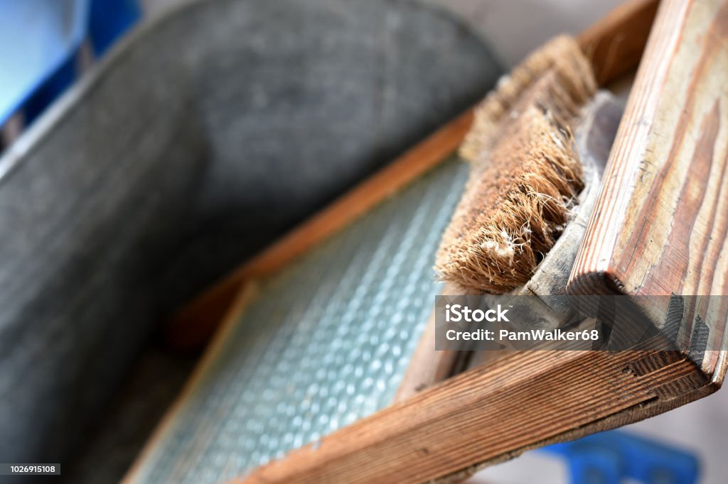 Vintage Laundry Washboard And Scrub Brush Stock Photo - Download