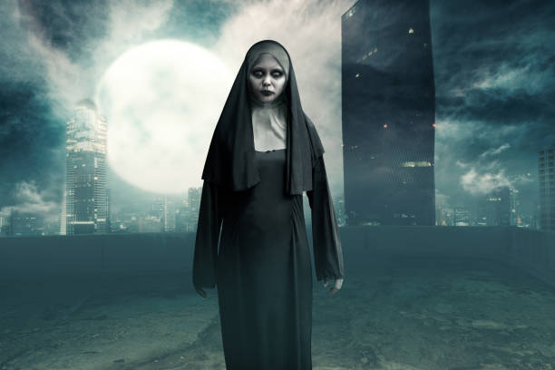 istock Creepy asian devil nun standing on building roof 1026918246