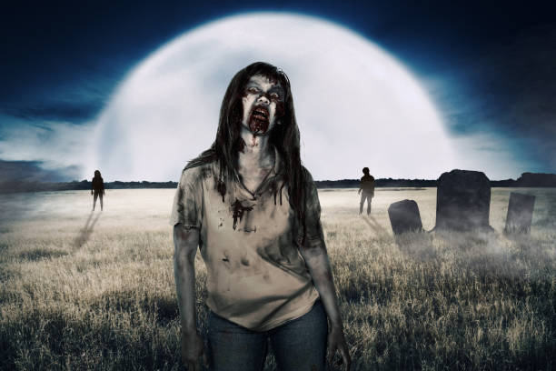 istock Zombies walking around on the cemetery 1026922954