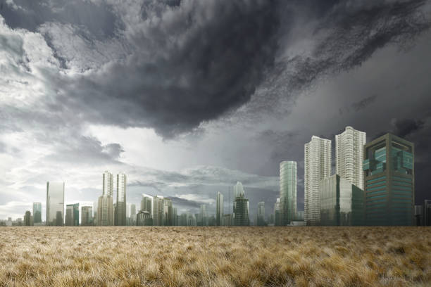 istock Dark city with dry grassland and dark cloud on the sky 1026926148