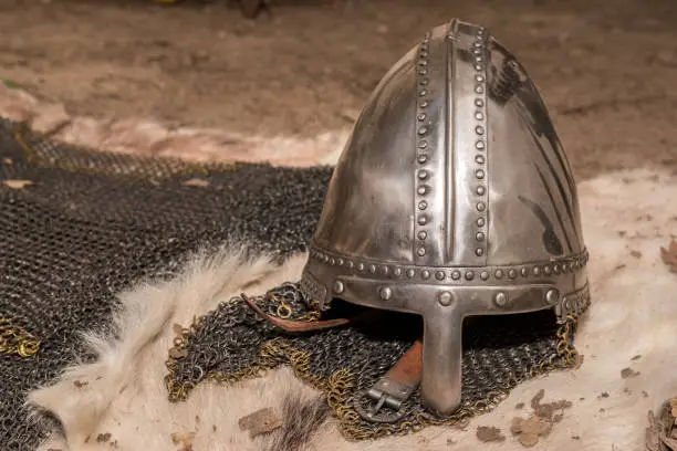 Replica Replica of a medieval warrior medieval helmet and chainmail armor on a genuine fur.