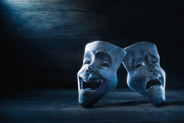 istock Theater masks on a dark background/ 3D rendering 1026947716
