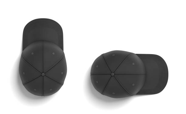 istock 3d rendering of two black baseball caps lying on a white background horizontally and vertically in a top view 1026951554
