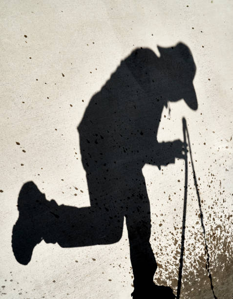 istock Shadow Person spraying a Water Hose 1026954040