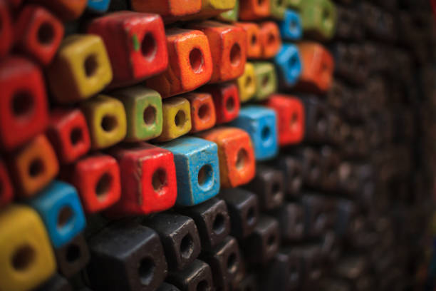 istock colorful cubes decorating wall background design, wallpaper, backdrop, abstract dice, box or bead shape. 1026956970