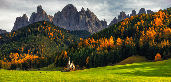 Santa Maddalena (St Magdalena) village with magical Dolomites mountains in background, Val di Funes valley, Trentino Alto Adige region, Italy, Europe