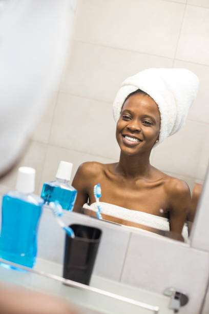 istock African woman in bathroom 1026979836
