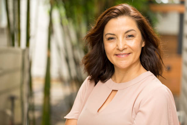 istock Happy Hispnaic woman smiling. 1026982332