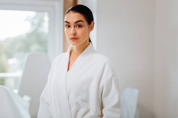 istock Pleasant attractive woman getting ready to a beauty procedure 1026995932