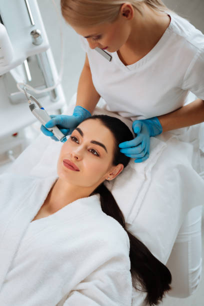 istock Nice pleasant woman having a beauty procedure 1026999254