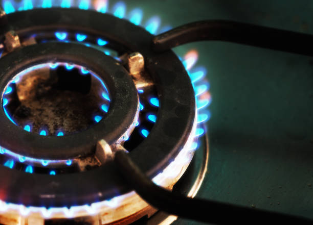 istock Gas ring with multiple outlet holes burning brightly 1027008584