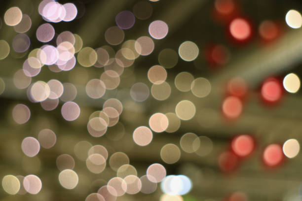istock Abstract blurred interior decorated lighting in light brown red and pale pink color gradations 1027013288