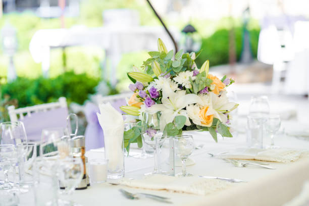 istock Beautiful fresh flowers table decoration in a restaurant for a special event 1027013636