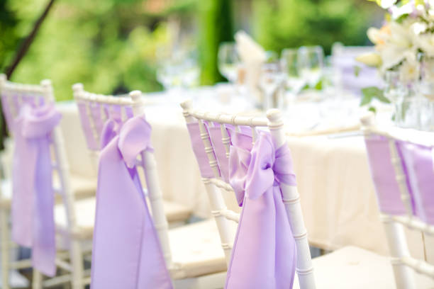 istock Chair decoration with a ribbon for a special event/wedding 1027015904