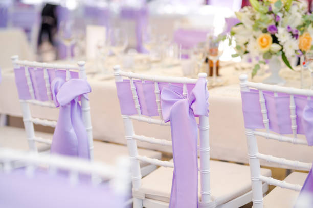 istock Chair decoration with a ribbon for a special event/wedding 1027016018