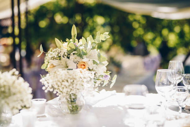 istock Beautiful fresh flowers table decoration in a restaurant for a special event 1027016040