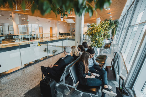 istock People waiting for boarding at the airport 1027016214